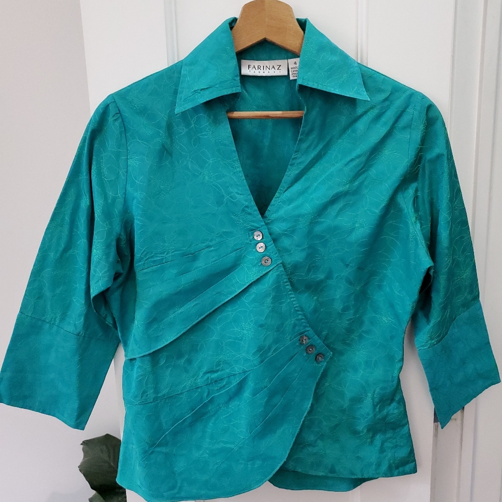 Farinaz Taghavi teal flower blouse